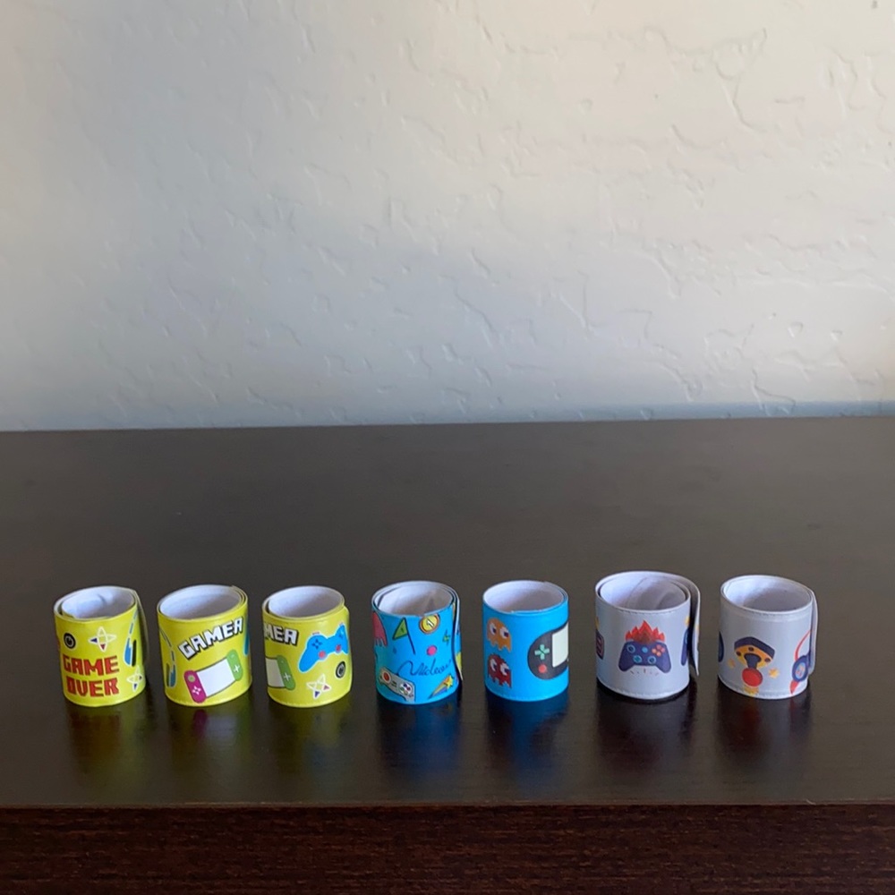 Gaming bracelets  8.5”. Lot of 7 Bracelets. 6 in great condition,1 little damage